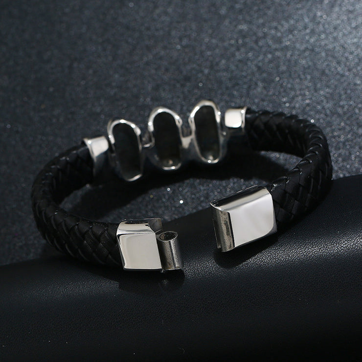BRACELET VINTAGE EN CUIR TRESSE TETE DE MORT