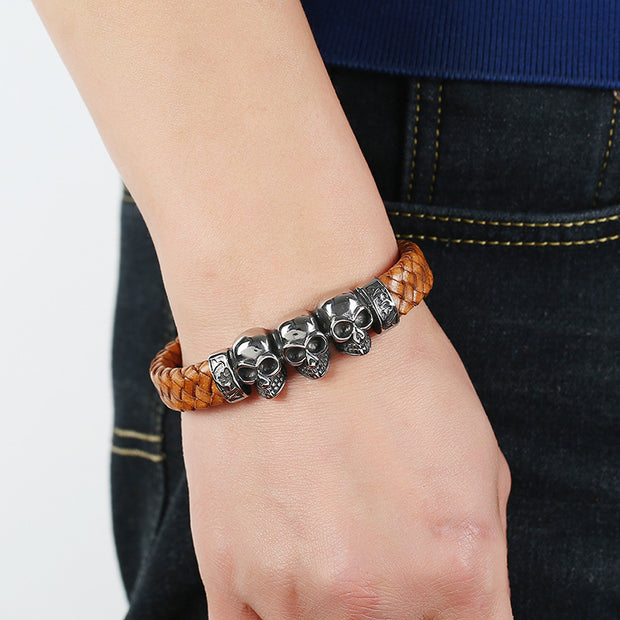 BRACELET VINTAGE EN CUIR TRESSE TETE DE MORT