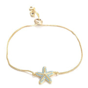 bracelet chaîne breloque doré