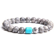 bracelet homme avec perle grise